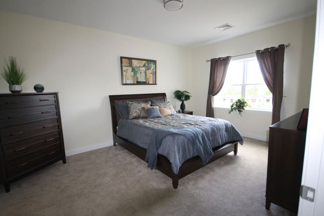 Bedroom with dark furniture